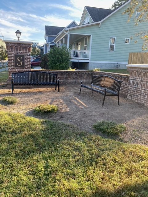 Benches dedicated to Brother Ray at the front of the Southside Community