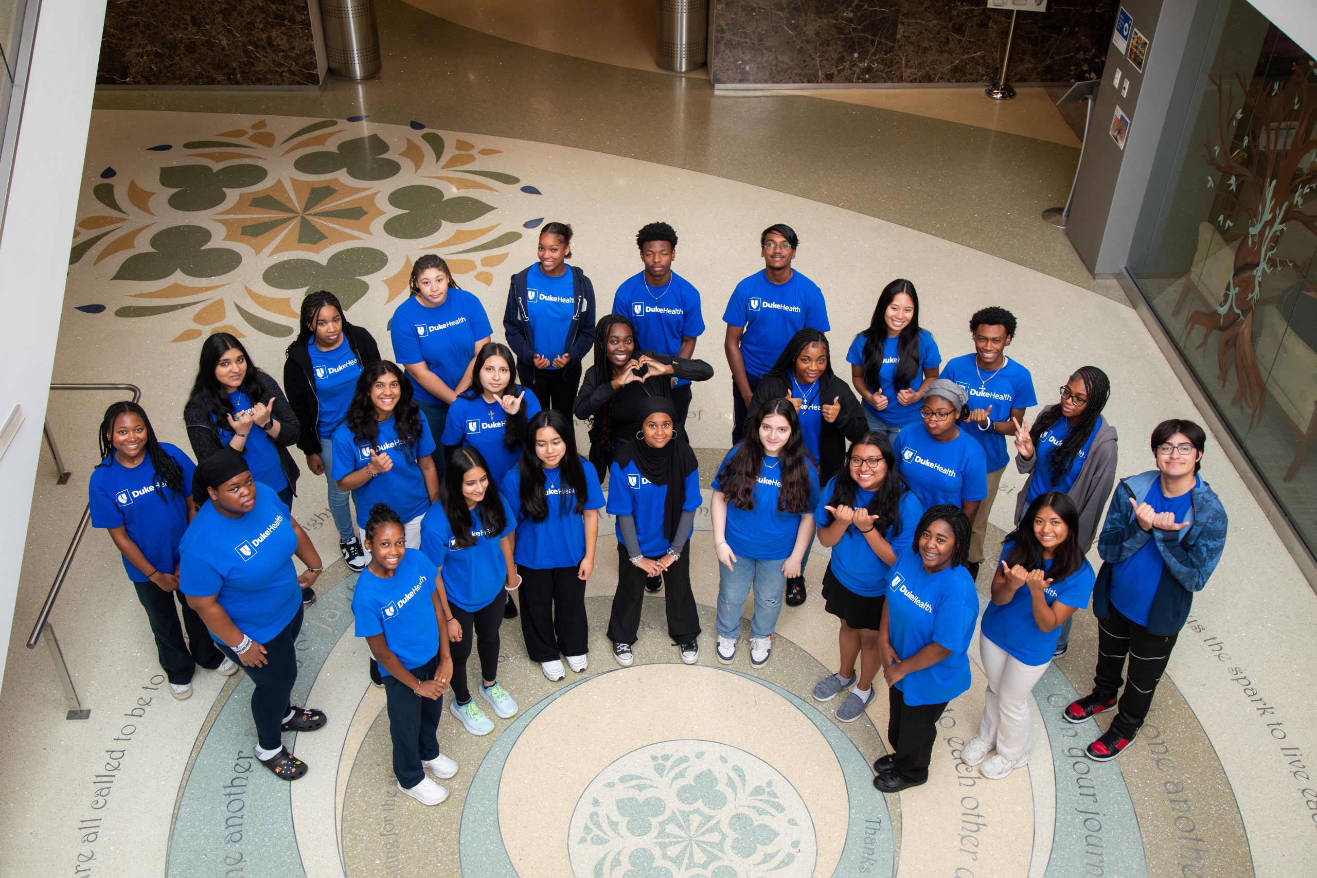 Students in the 9th annual MaryAnn Black Summer Internship Program at Duke Health gathered for a group portrait in the Duke Cancer Institute Piano Area on Thursday, July 25, 2024.